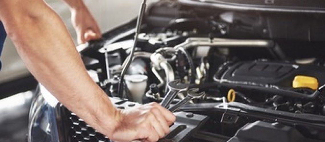 close-up-hands-unrecognizable-mechanic-doing-car-service-maintenance_146671-19689